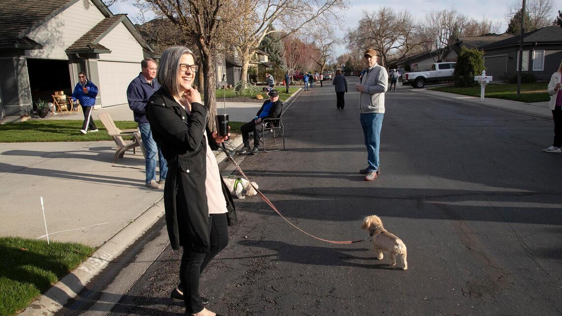 Garden City neighbors organize evening strolls to look after each other — at a safe distance