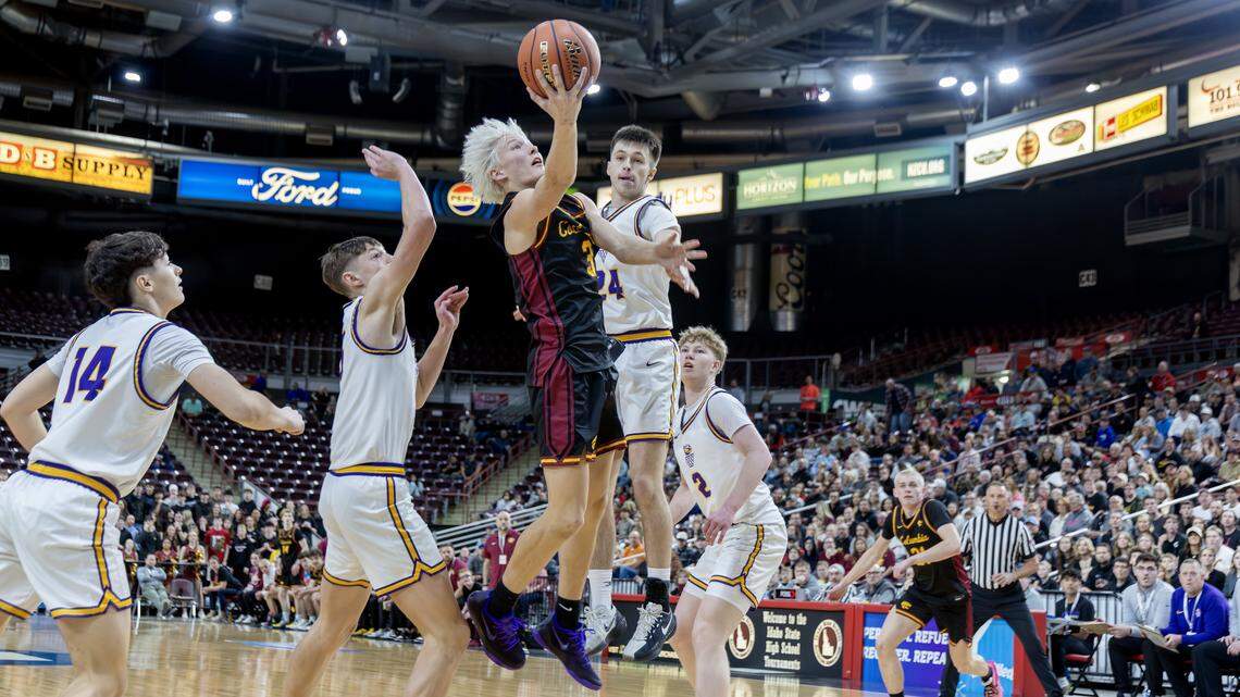 Columbia junior Easton Lott makes a basket in the second quarter of their 5A boys basketball state tournament semifinals game against Lewiston held at the Ford Idaho Center in Nampa, Friday, March 6, 2026. Lewiston won 58-50.