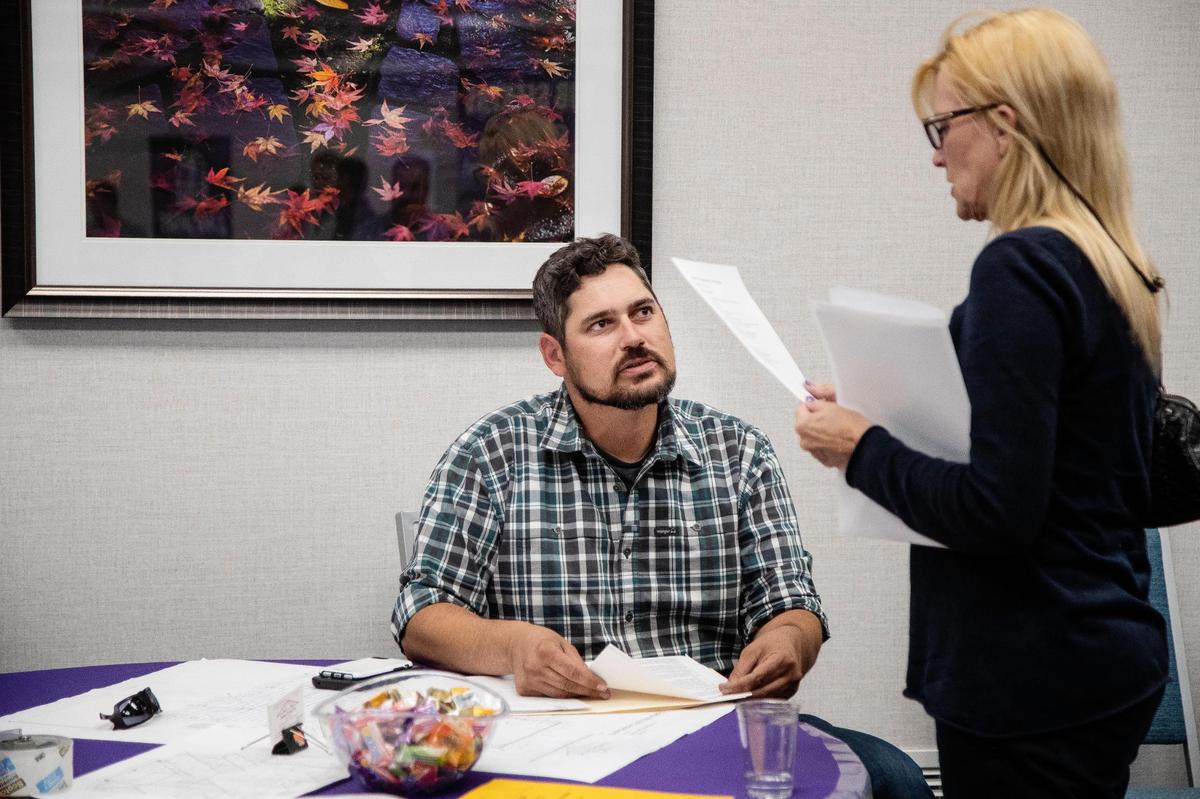 Keith Oxford of Valley Truss gives information about the company and positions available to Carla Hill of Boise during a job fair hosted by the Idaho Department of Labor on Thursday, May 27, 2021 at Hampton Inn-Boise Spectrum. Hill moved to Idaho from Nevada with a Master’s degree in construction management, and she’s hoping to find a job that fits her education path.