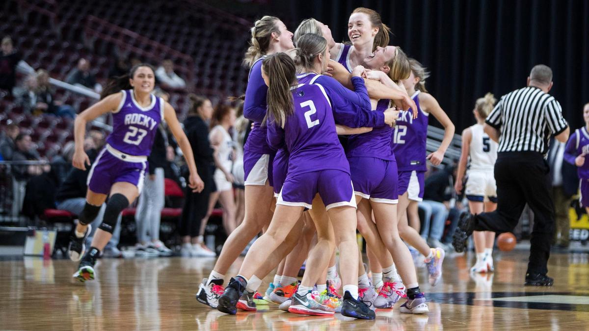 Rocky Mountain celebrates a 55-52 overtime victory over Thunder Ridge in the first round of the 5A girls basketball state tournament Thursday.