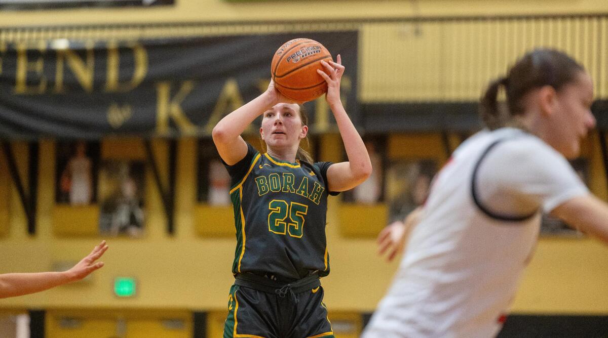 Borah’s Kya Davis sores during their 6A District Three girls basketball semifinal game last season against Boise.