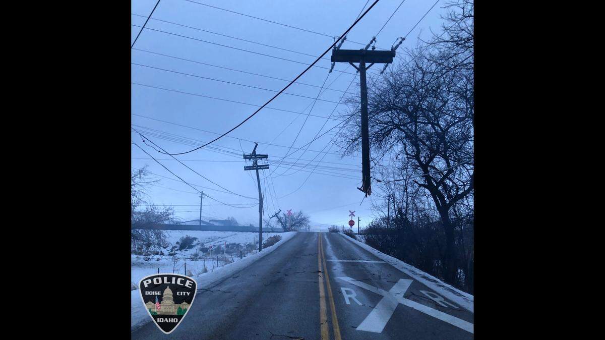 A single-vehicle crash at Federal Way and Victory Road damaged multiple power poles on Wednesday, Jan. 5, 2022, causing a power outage for thousands.