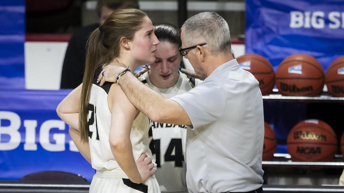 Idaho women’s basketball head coach Jon Newlee gives a hug and some words to his two seniors, Mikayla Ferenz and Taylor Pierce (14), as they leave the game. Portland State defeated the Vandals 75-59 in the semifinals of the Big Sky Conference women’s basketball tournament Wednesday, March 13, 2019 at CenturyLink Arena in Downtown Boise.