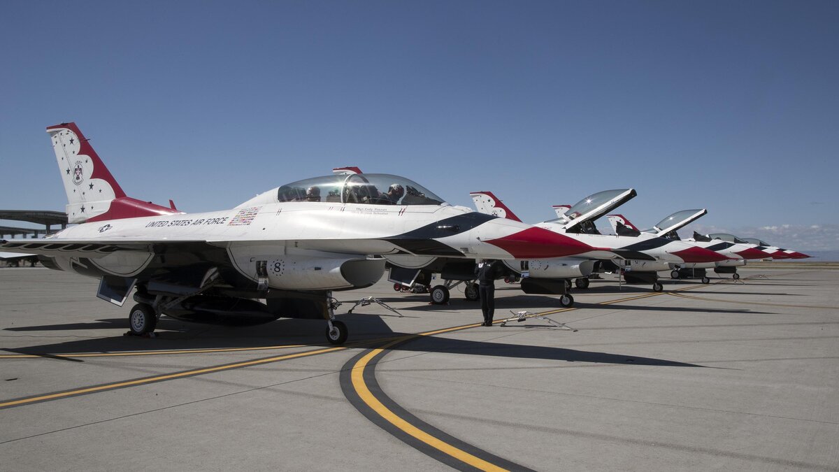 Statesman video editor Kelsey Grey buckles in and prepares for her flight F-16 Thunderbirds advance pilot Maj. Brandon Felker Friday, June 1, 2018 at Mountain Home AFB.