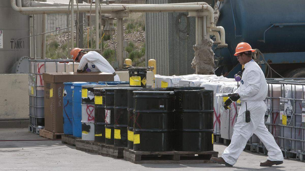 In this file photo, container management operators at U.S. Ecology Idaho near Grand View catalog closed drums filled with various types of hazardous waste in a temporary storage area where new material is analyzed.