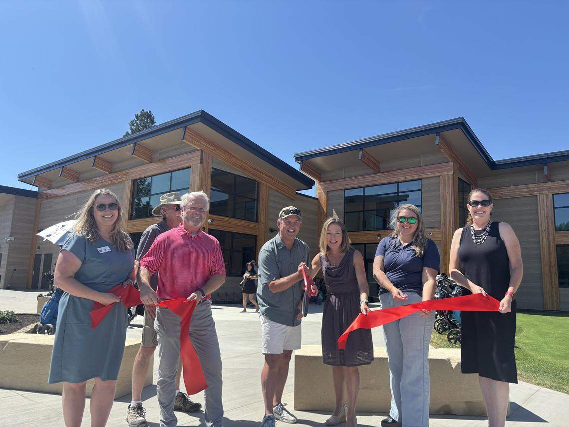 Boise city leaders, including Mayor Lauren McLean, center, gather Wednesday afternoon to unveil the new Warm Springs Grill + Golf clubhouse in East Boise. 