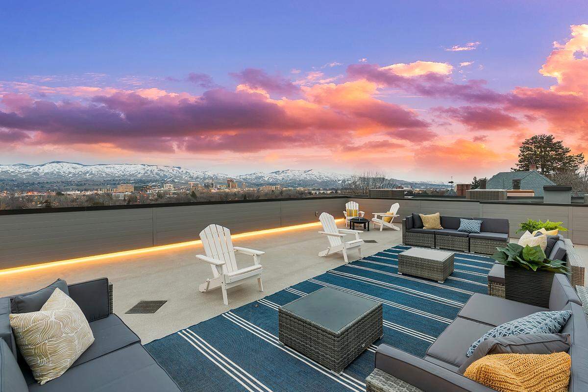The rooftop deck, including a hot tub and attached shower, is one of the additions Wendaldt added to the house after he purchased it.