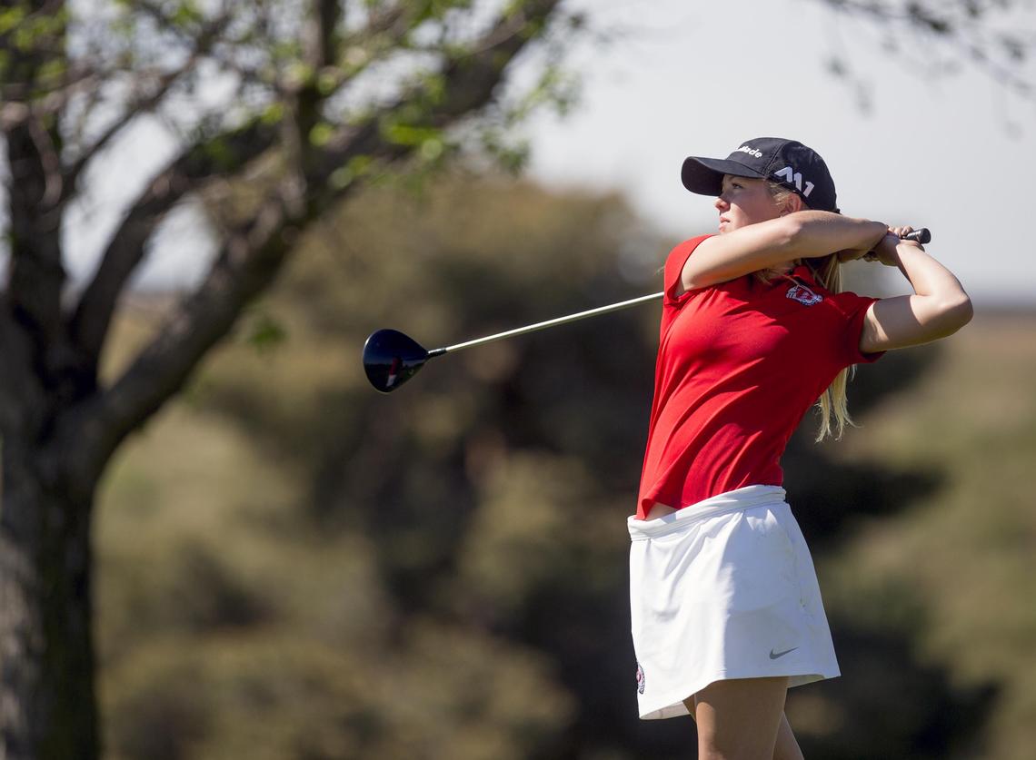 Boise High's Emily Cadwell tees off on the fifth hole during the 5A District Three girls golf tournament Tuesday at Centennial Golf Course in Nampa. Cadwell won the individual title with a 2-under 70.