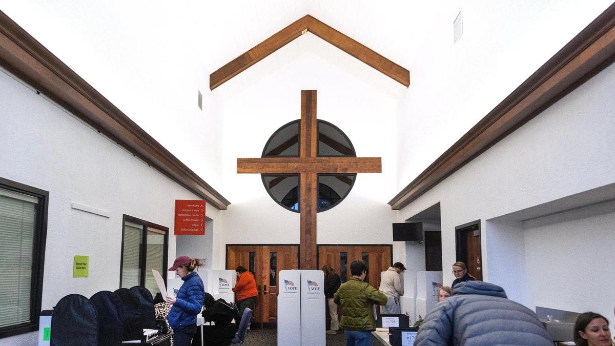 Idahoans at the polling location for precinct 1709, Discovery Church, cast their ballots on Election Day in Boise.