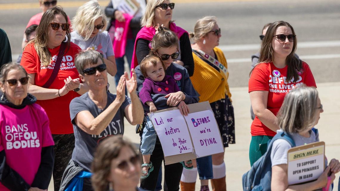 Women protest against Idaho's abortion ban in this April file photo.