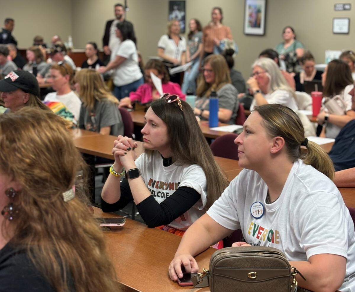 Many donned “Everyone is welcome here” T-shirts at the West Ada board meeting.