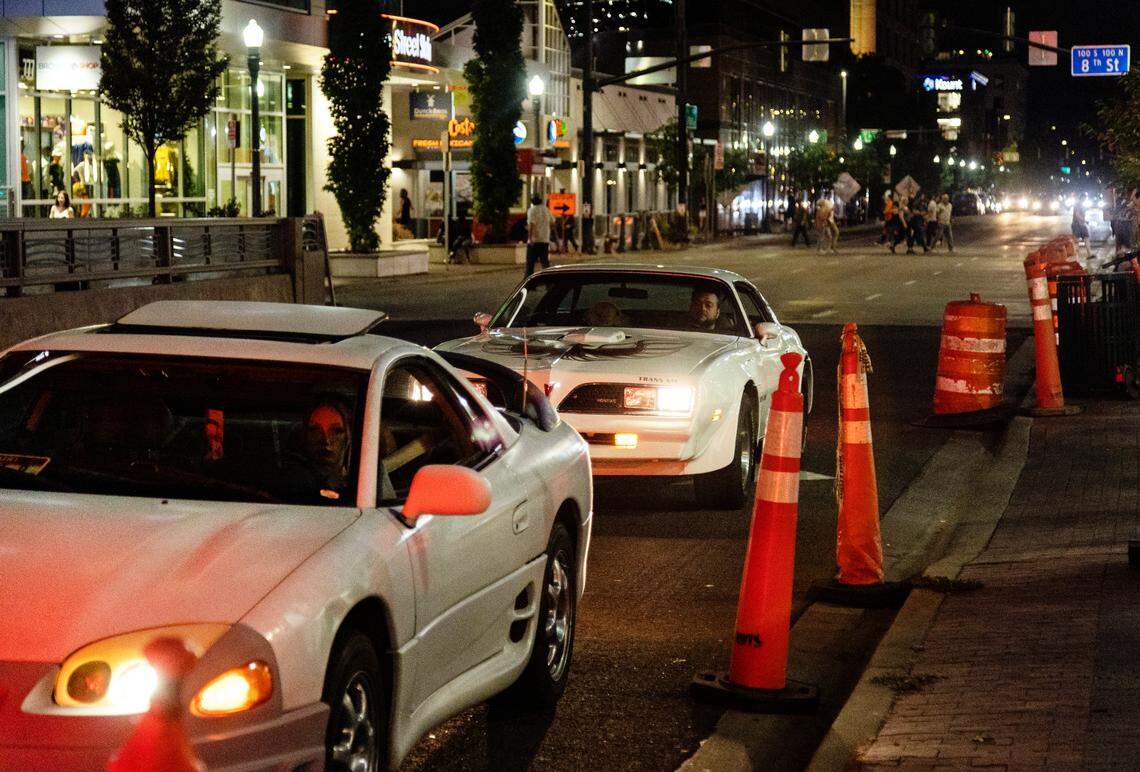 Cars rev their engines while at a stop light on Main Street in Boise on Friday. Loud vehicles circling the downtown blocks of Boise are a common sight and sound on Friday and Saturday nights.