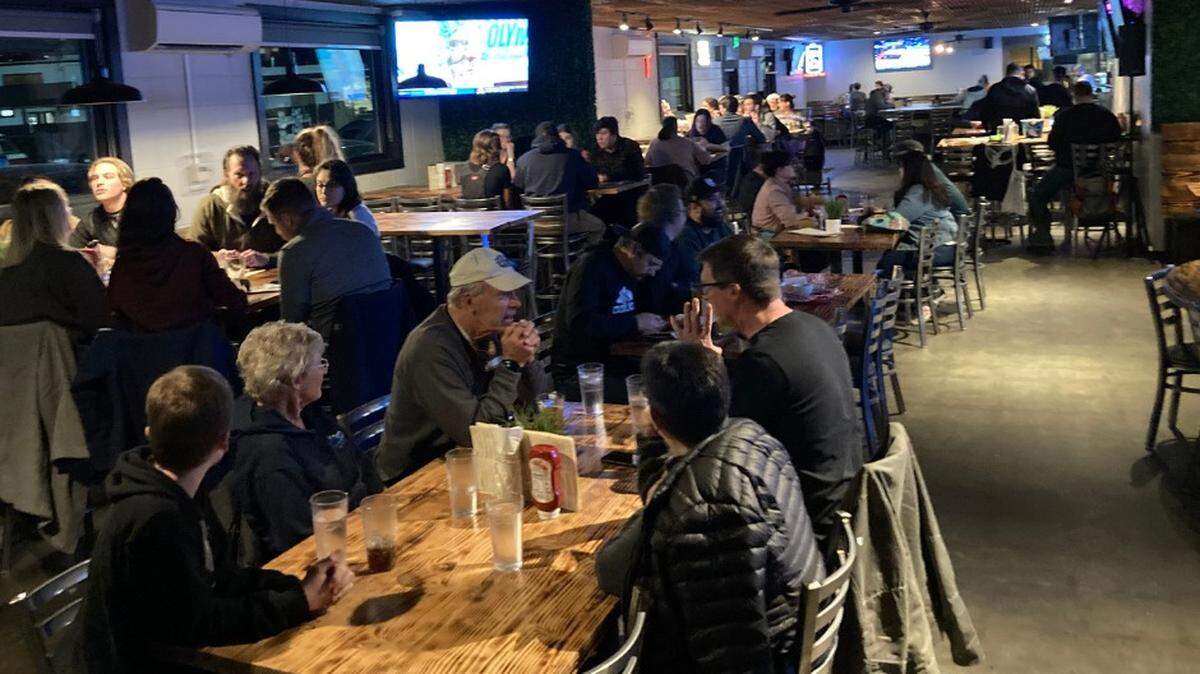Customers enjoy food and drink inside the restaurant and bar, which was remodeled after the Dutch Goose closed.