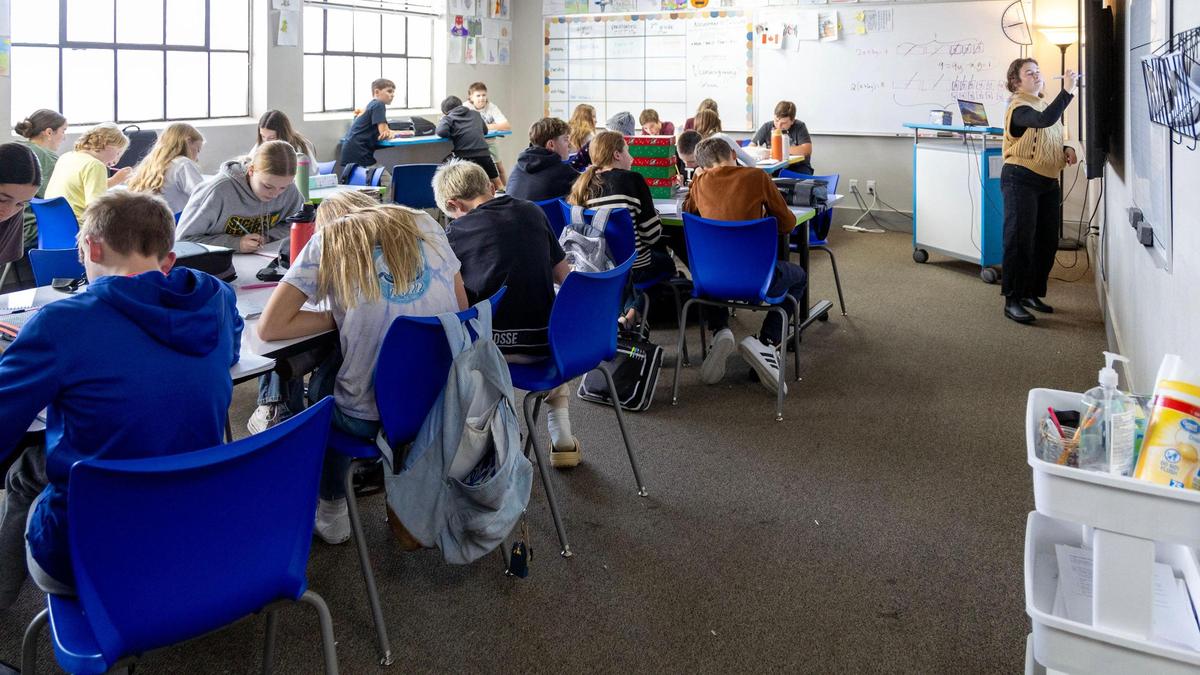 Middle school students concentrate on math problems at Cole Valley Christian school in Meridian.
