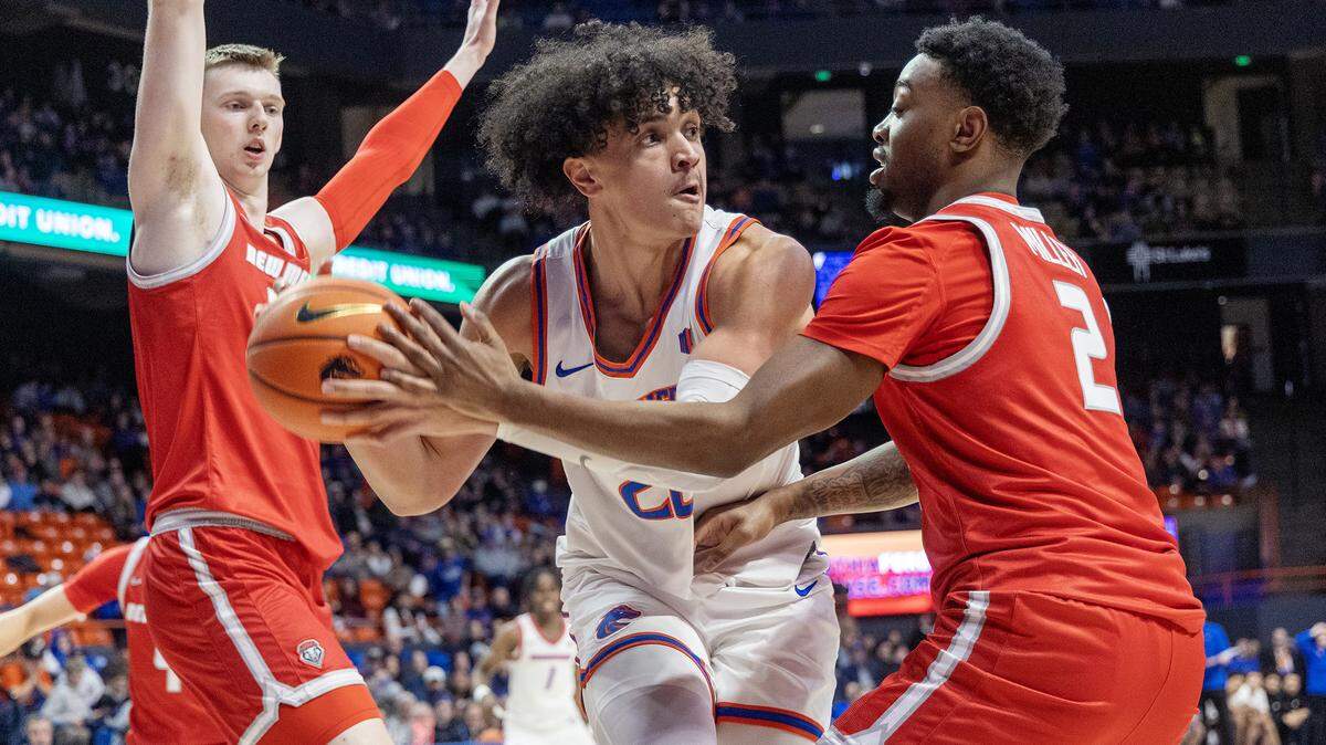 Boise State’s Javan Buchanan tries to escape a New Mexico double team in a game at ExtraMile Arena last year.