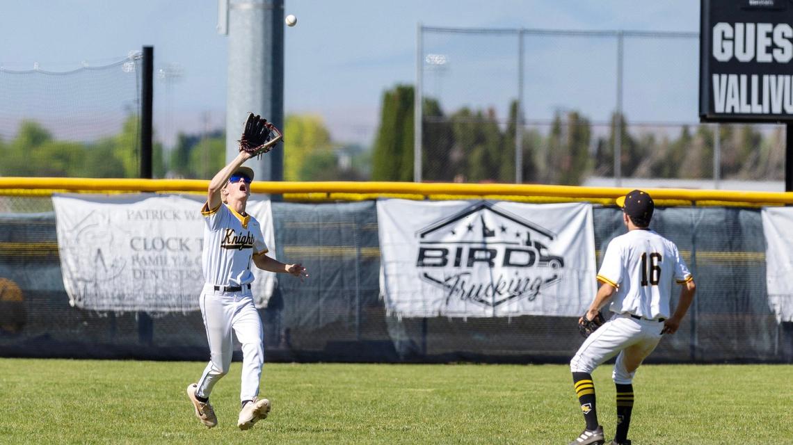 Bishop Kelly’s Zach Wright makes a catch in the outfield during the state tournament last season.