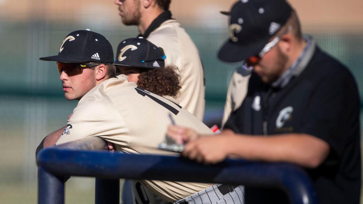 Capital pitcher Calvin Connelly cheers on his teammates from the dugout waiting to be called to the mound against Meridian on April 16 at Meridian High School.