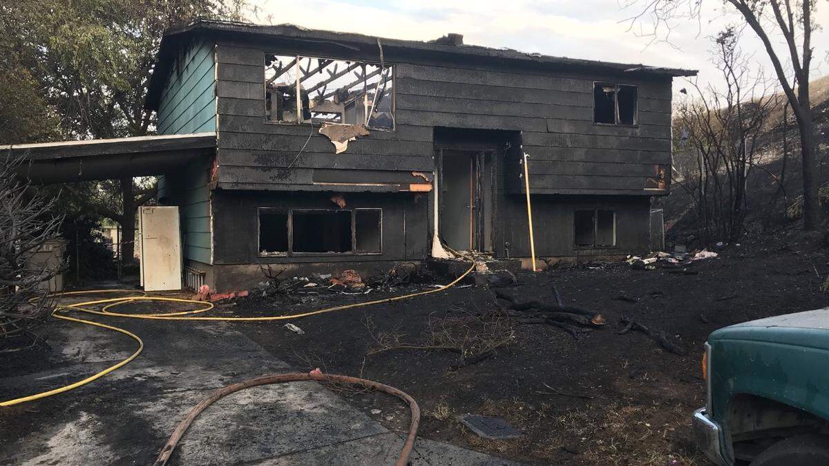 Children playing with fire caused a grass fire that burned this house down late Friday afternoon.