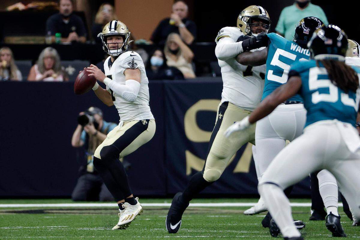 New Orleans Saints quarterback Taysom Hill, a Highland High graduate, drops back to pass in the first half of an NFL preseason football game against the Jacksonville Jaguars in New Orleans on Monday, Aug. 23, 2021.