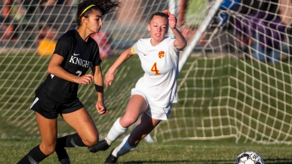 Columbia senior Kaylee Fone succesfully defends an open net against Bishop Kelly’s Izzy Perez in the 4A District Three championship game. Both were named to the 4A SIC academic team.