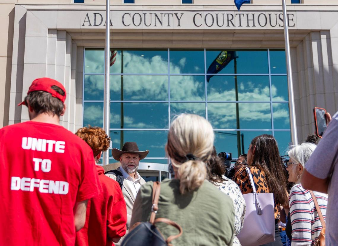 Ammon Bundy speaks to members of the media and the public outside of the Ada County Courthouse.