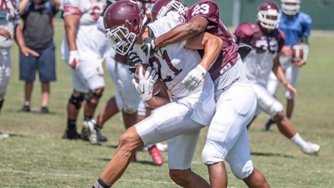 Mt. San Antonio College tight end Austin Griffin (21) makes a catch during practice.