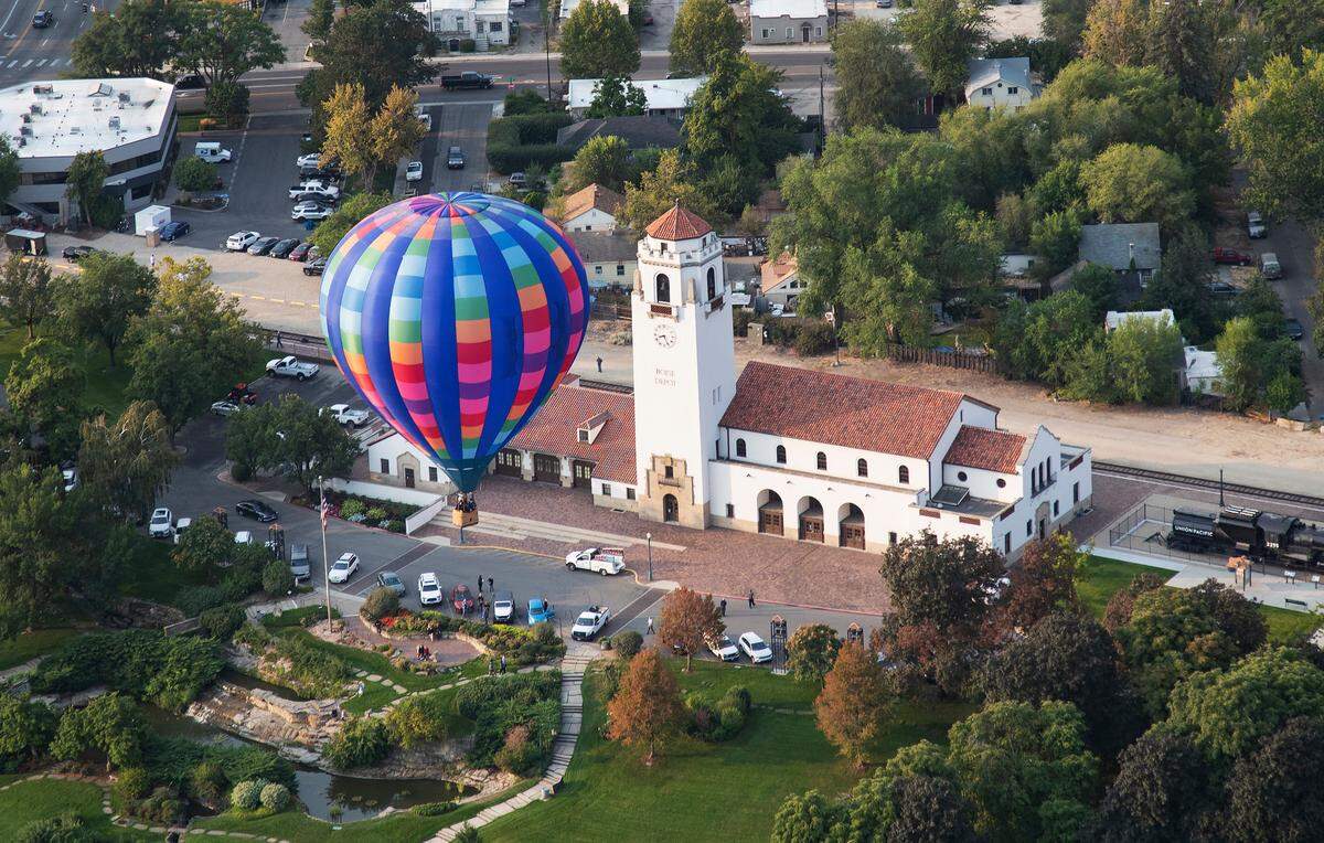 Hot air balloons fly over Boise from Ann Morrison Park just after sunrise as part of the Spirit of Boise Balloon Classic on Thursday, Sept. 2, 2021.