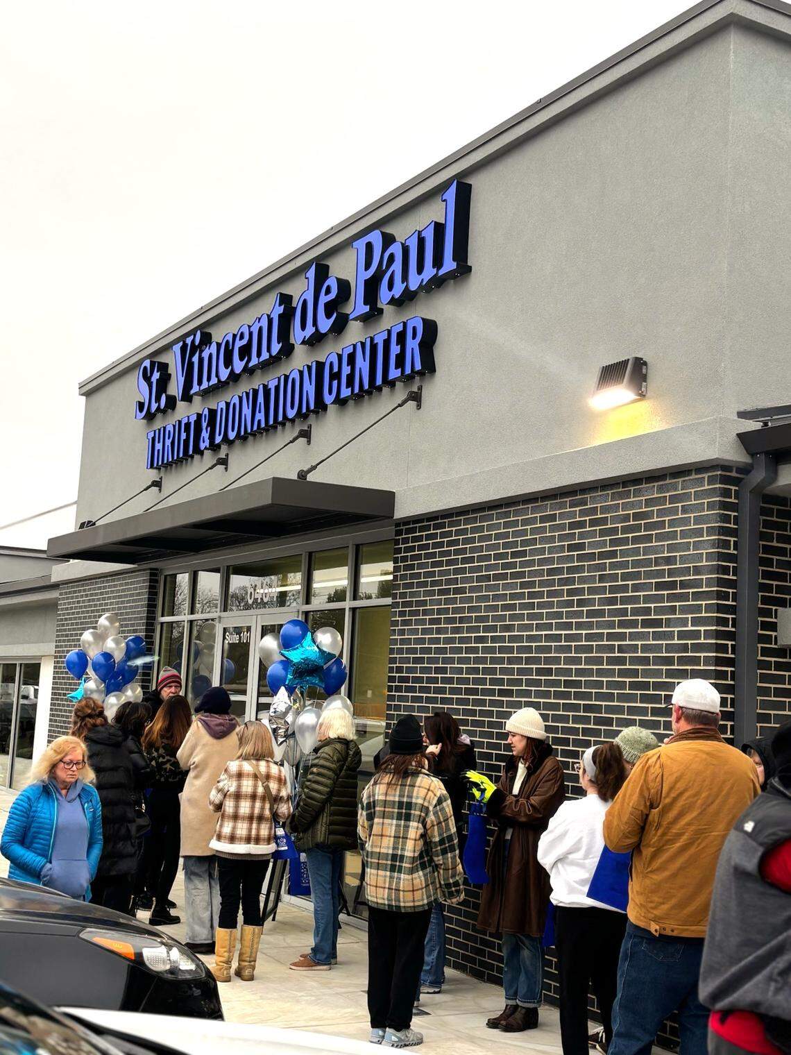 Shoppers wait outside before the grand opening of St. Vincent de Paul’s thrift store at 6464 W. State St. in Boise.