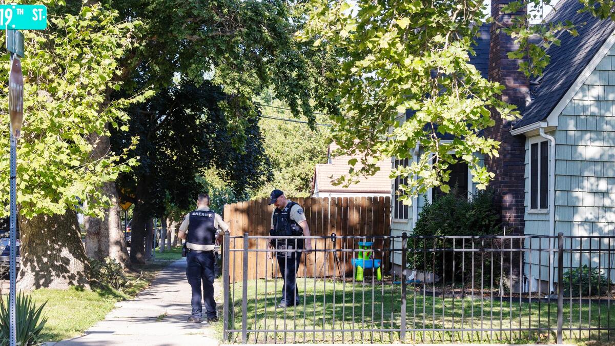 Law enforcement officers work in the perimeter of a multi-block crime scene Thursday, July 27, 2023 following a shooting Wednesday night near the 700 block of N. 20th St.