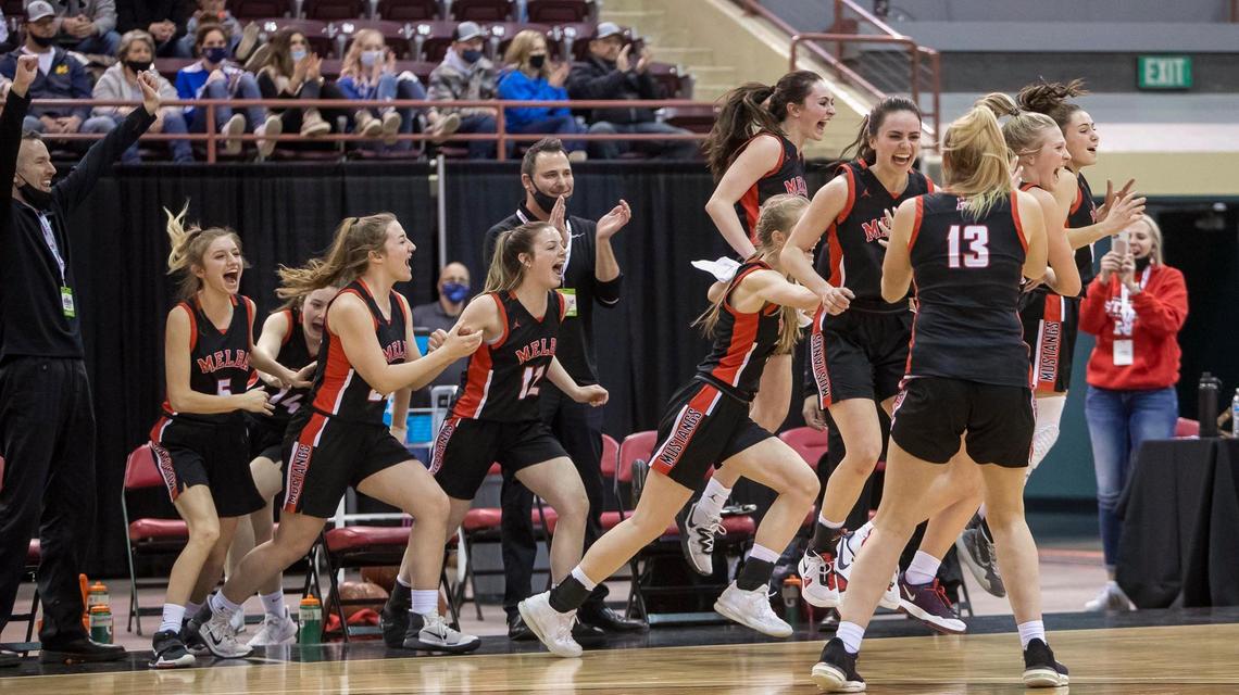 Melba explodes off the bench after defeating Bear Lake 51-40 to win the 2A state title Saturday.