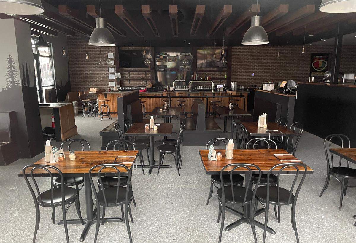Customers who peek through the window will find an empty, dark restaurant at Zeeks.