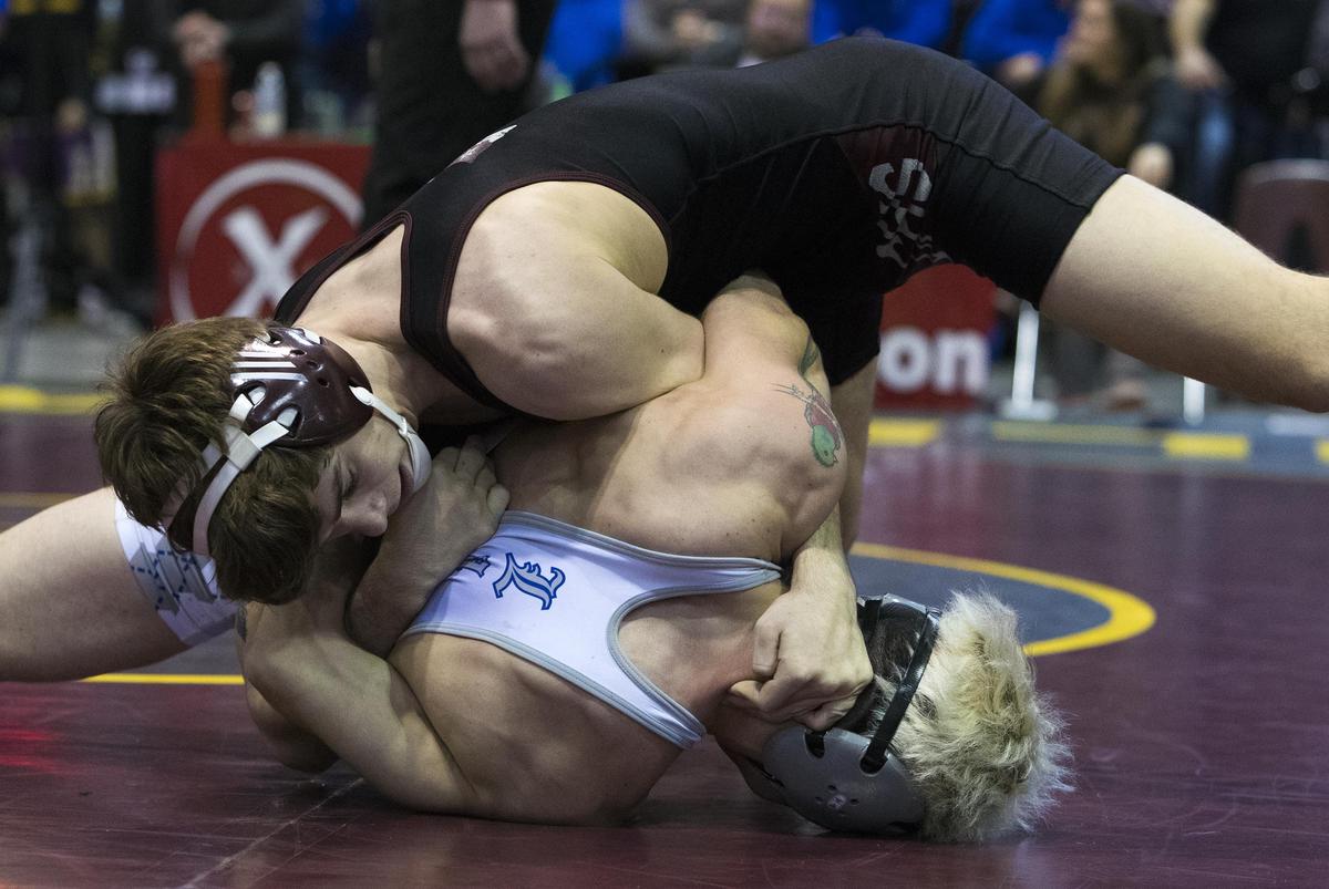Centennial’s Ryan Wilson puts Kai Ward,, McQueen (Nev.) into position for a near fall during the championships of the Rollie Lane Invitational Saturday, Jan. 5, 2019 at the Idaho Center in Nampa. Wilson won the match in a 11-3 decision.