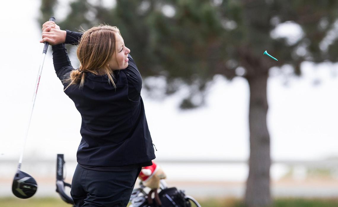 Vallivue’s Claire Hall tees off during the 4A District Three golf tournament held at TimberStone Golf Course in Caldwell on Wednesday.