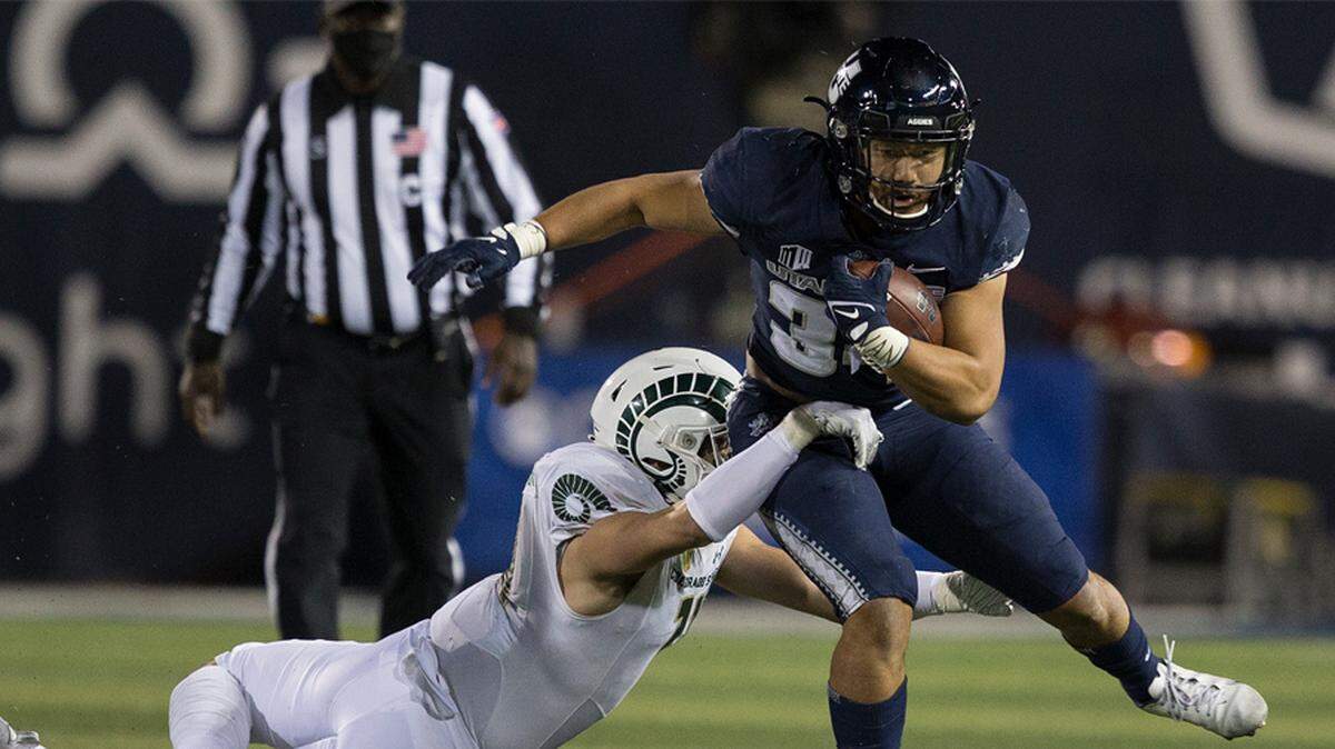 Running back Elelyon Noa was second on the team at Utah State last season with 597 rushing yards. He will join his older brother, Ezekiel, at Boise State this season.