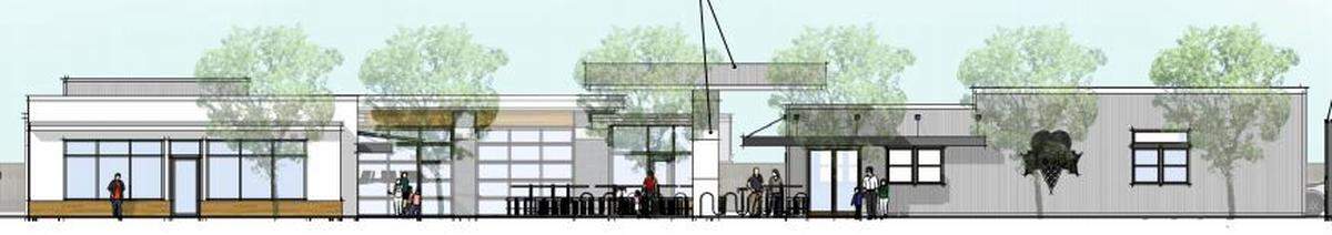 The owner of a former car wash at 13 S. Latah St. is planning a three-building complex with The STIL ice cream shop, right, a restaurant in the middle and a retail store on the left.