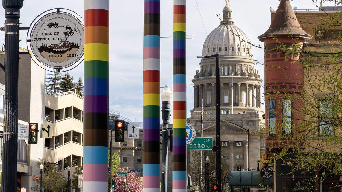 After removing Pride Flags at Boise City Hall, per new laws passed by the Idaho Legislature, the flagpoles are now rainbow striped, Tuesday, April 7, 2026.