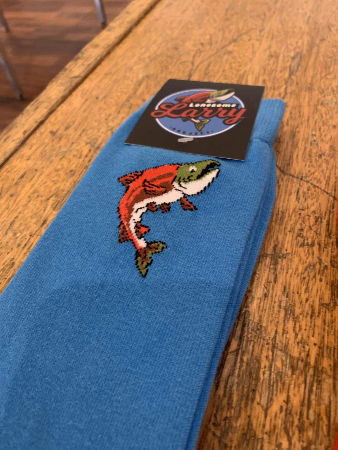 More than 500 pairs of socks have been sold by the self-proclaimed “Sock Guy for the Sockeye,” who was motivated by Lonesome Larry’s story.