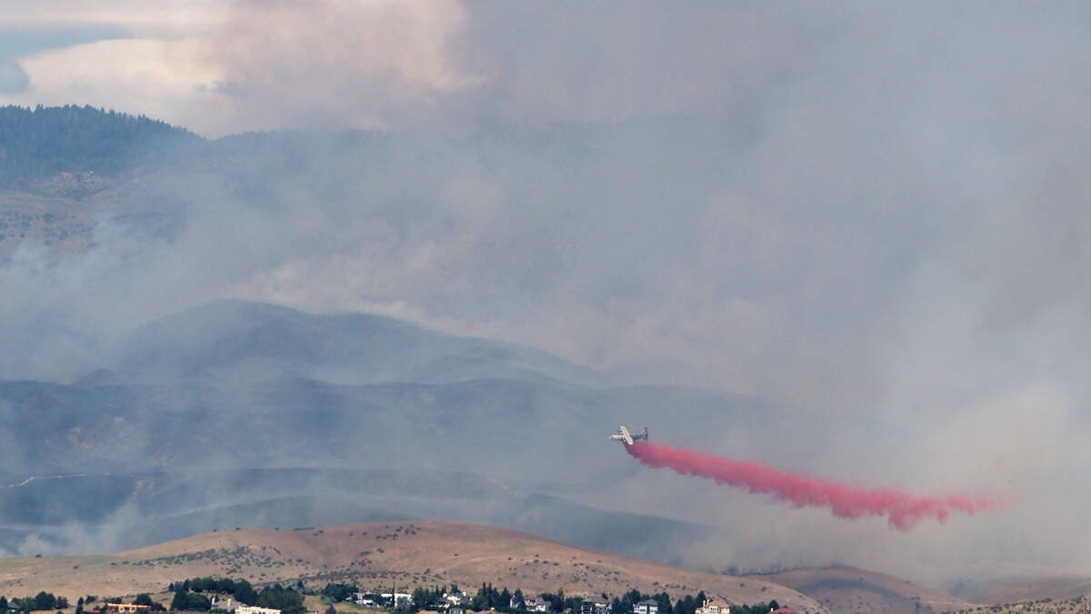 An air tanker fights the Claremont Fire on July 6.