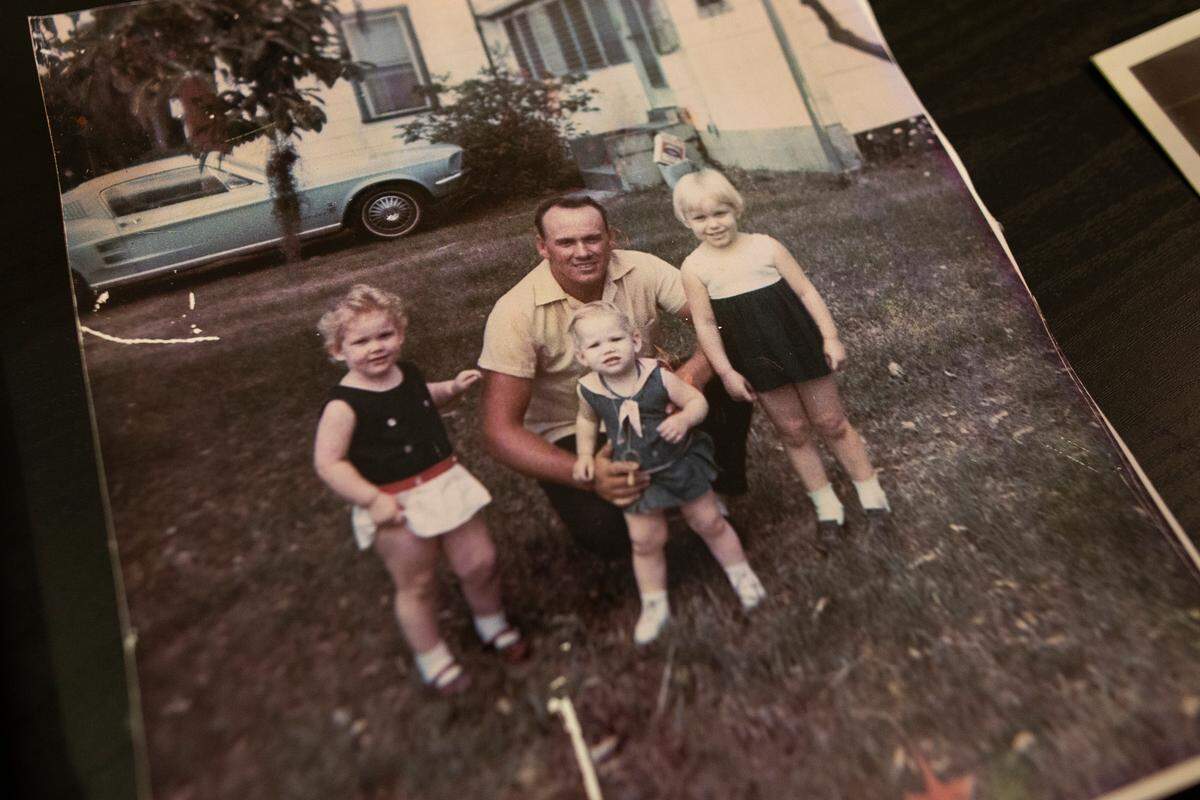 A 1971 family photo shows Christal Collins (left); her father, Bill Collins; and her sisters, Tracy and Marie.