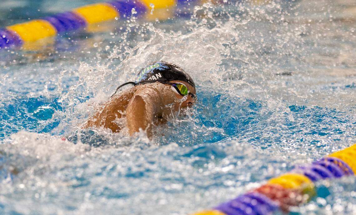 Mountain View’s Jaden Akpan competes in the 500-yard freestyle at the 5A state meet held at the West Family YMCA and Boise City Aquatic Center last season.