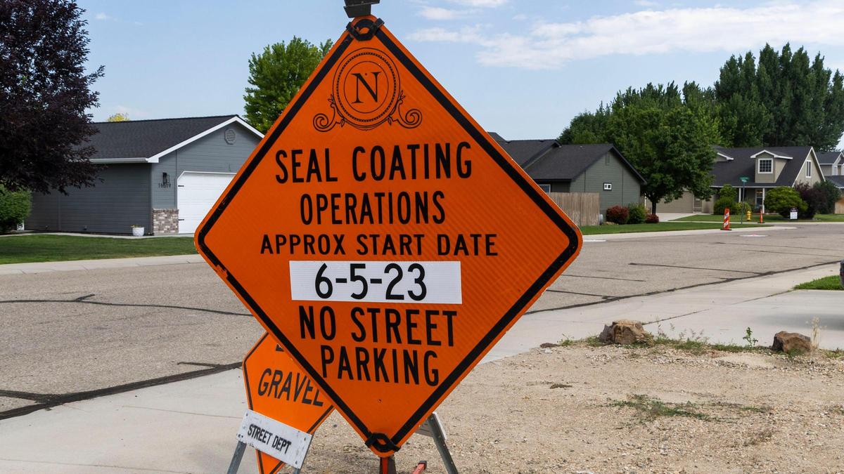 Before seal coating a street, the city of Nampa posts signs to notify residents. The city distributed door hangers with information about the 2023 chipsealing project to subdivisions in May.