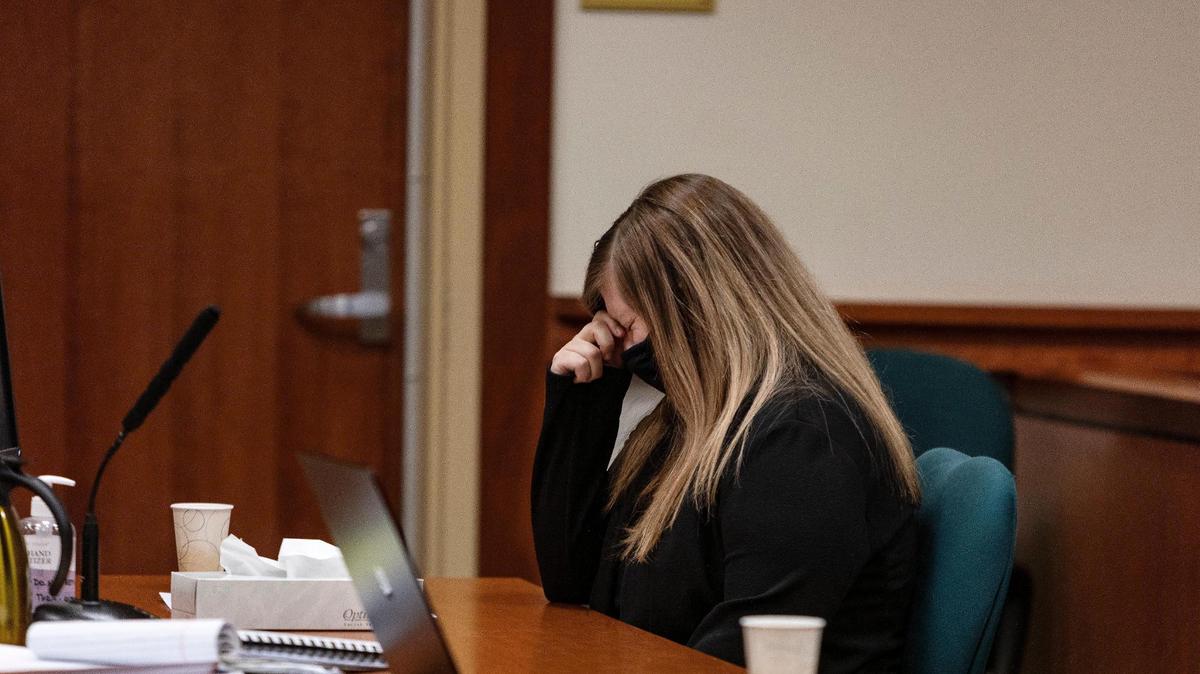 Danielle Radue reacts to hearing details of the injuries that led to her son’s death during her sentencing in the Idaho Fourth Judicial District Court at the Ada County Courthouse on Friday.