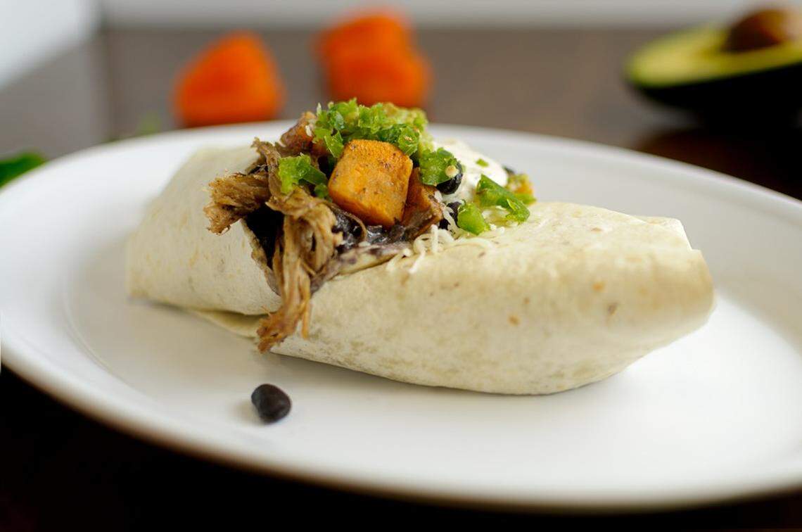 Jordan’s Burrito at KB’s is pork, grilled yams, cheese, your choice of beans, guacamole, jalapeño, cabo sauce and salsa.