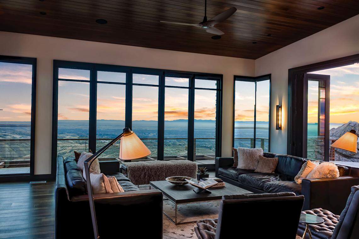 The home is designed to embrace views with retractable glass walls.