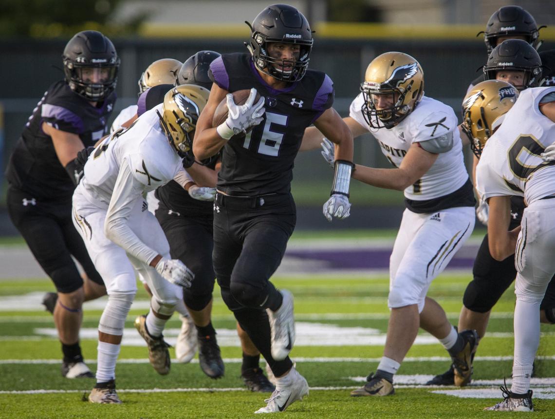 Rocky Mountain’s Trevor Van Gerpen breaks free for an 88-yard touchdown run last week against Capital.