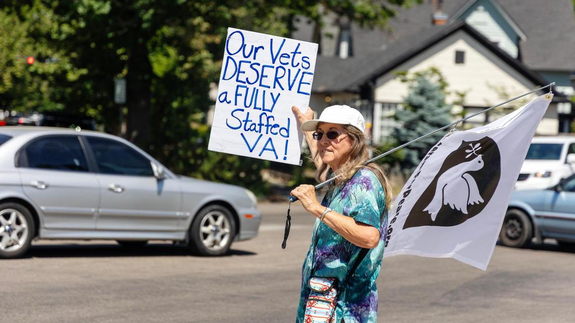 Retired Air Force veteran Nancy Daniels holds a sign outside of the Boise Veterans Affairs Medical Center during a protest, Friday, June 6, 2025. Veterans gathered to protest drastic cuts to programs for veterans.