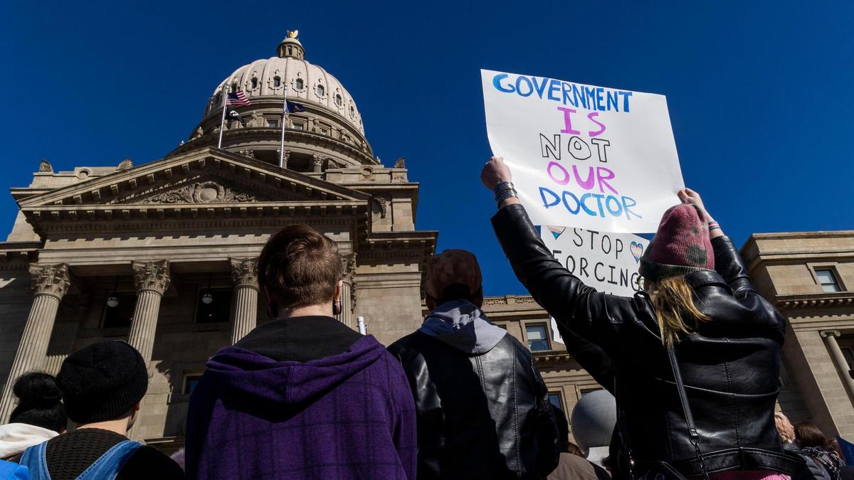More than 300 people gather in front of the Idaho Statehouse in opposition to anti-transgender legislation moving through an Idaho Republican congress, Friday, Feb. 24, 2023, in Boise.The event was organized by Access Coalition Taskforce (ACT), a collective of Idaho-based nonprofit organizations dedicated to individual rights.