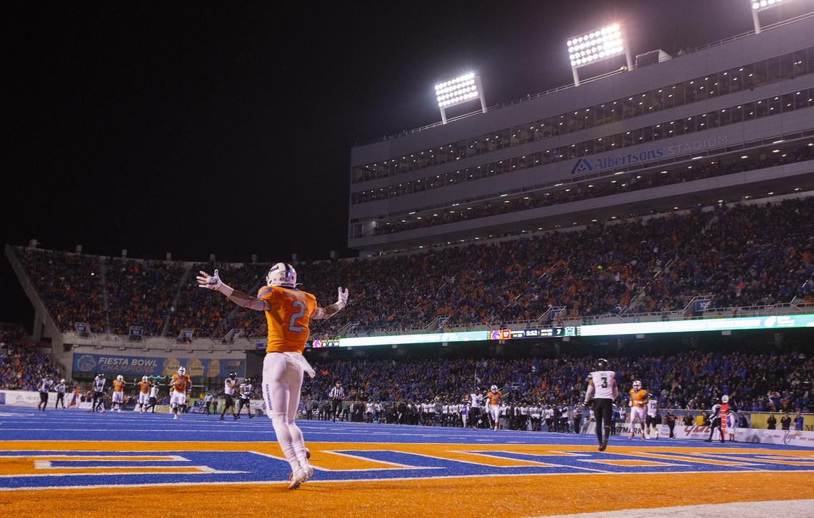 Boise State wide receiver Khalil Shakir (2) absorbs the cheers of a record-setting crowd at Albertsons Stadium after catching a touchdown pass in the second quarter against Hawaii on Saturday.