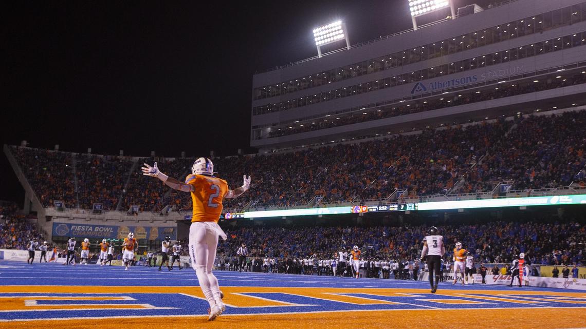Boise State wide receiver Khalil Shakir absorbs the cheers of a record-setting crowd at Albertsons Stadium after catching a touchdown pass in the second quarter of a game against Hawaii in 2019.