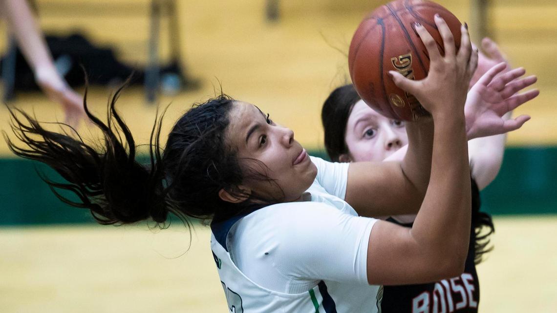 Mountain View junior Naya Ojukwu scores off an offensive rebound in the 5A District Three championship Feb. 12 at Eagle High School.